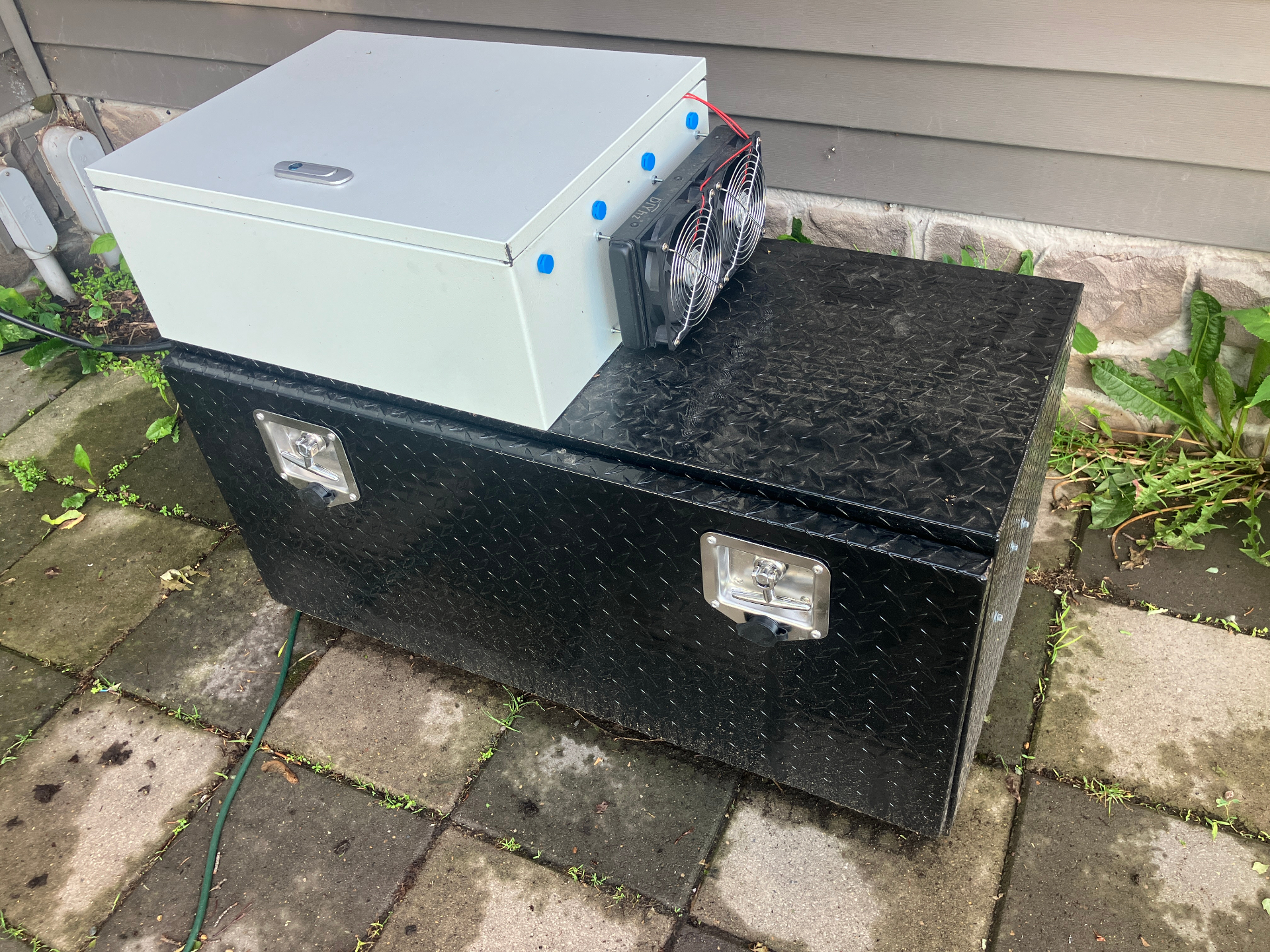 Real Sparxx generator built into a black diamond-plate aluminum truck box with electrical enclosure