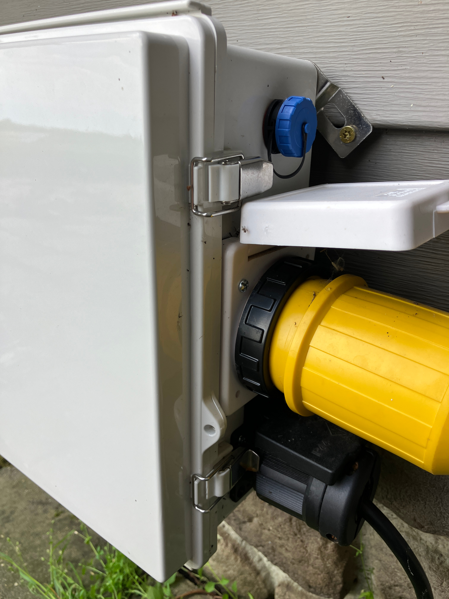 50-Amp generator inlet box connected to the ATS enclosure